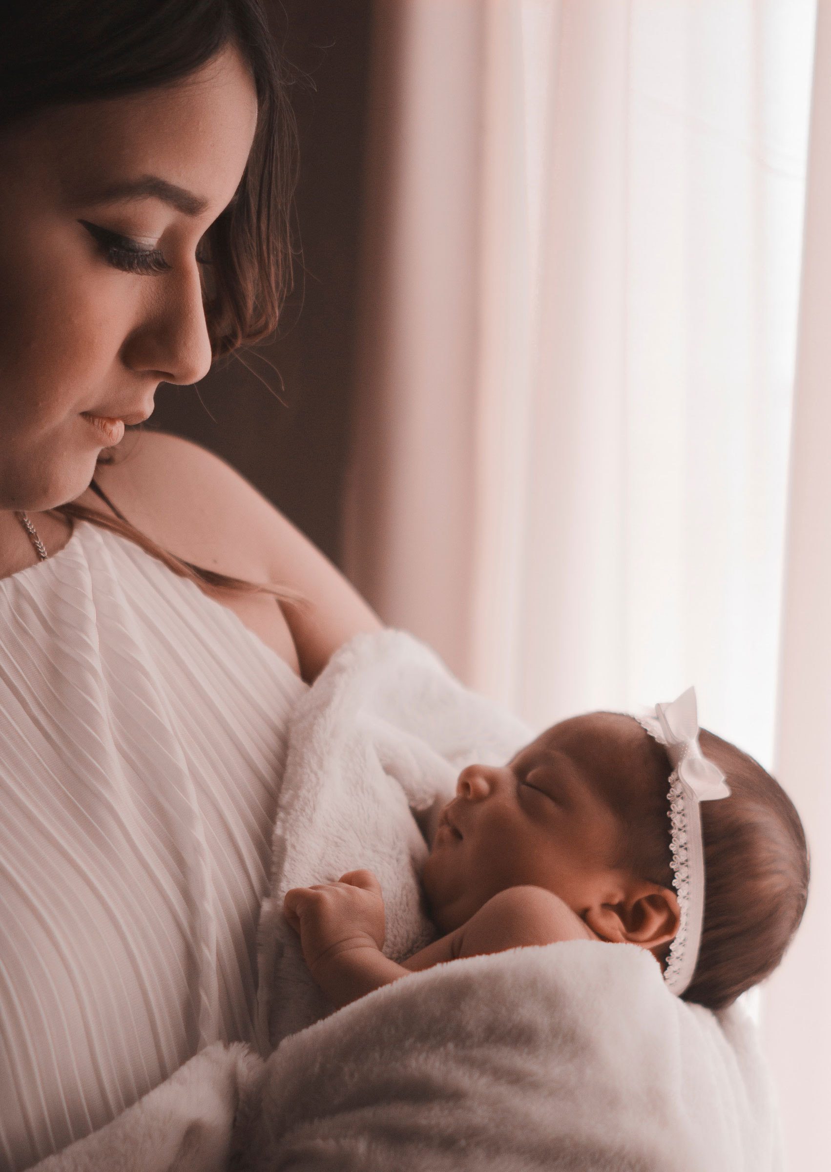 Young Mom Looking at Baby